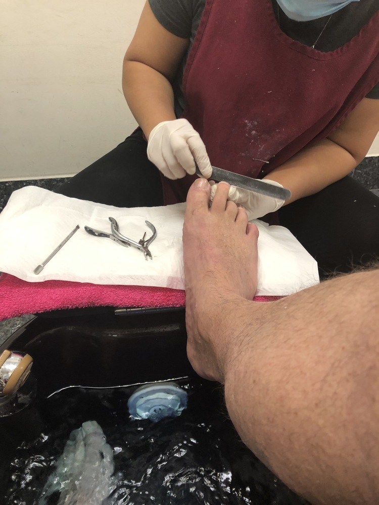 The shaping of the toenails...