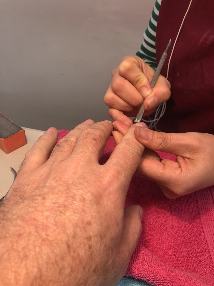 Manicuring those hands..